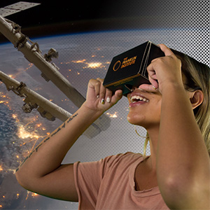 If you could go anywhere, where would YOU go? Explore new world through an epic Virtual Reality library, available on the FREE Franklin Institute mobile app. Campaign to drive app downloads for VR library. \
\
Visual concept: A photo of someone young and good-looking holding a phone in front of themselves and looking at it (shot looking at the back of the phone so we don’t see the screen but do see the person’s face). Their expression is one of wonder and amazement. Behind and surrounding this guest, we see the screenshots from our VR library—from the flight deck of the endeavor space shuttle, inside the Chernobyl control room, alongside the curiosity rover.

As creative director and design on this project, I worked closely with our Marketing to conceptualize and strategize, chose models, stills from VR libraries, art directed the photoshoots, and designed all digital advertisements.